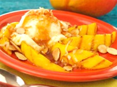 Grilled Mango with Spicy Rum Glaze and Vanilla Ice Cream